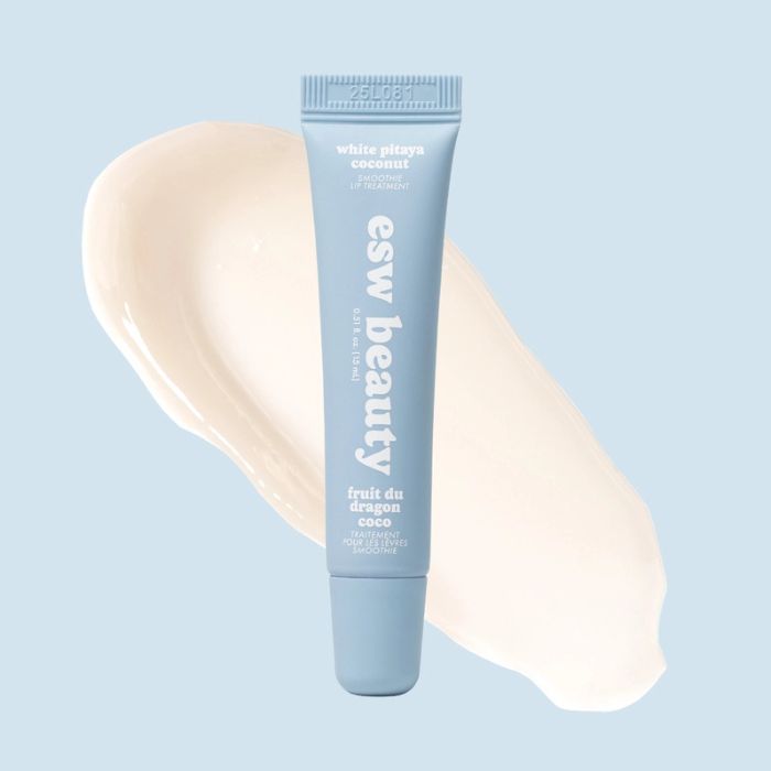 Blue tube of ESW Beauty White Pitaya Coconut Smoothie Lip Treatment on a light blue background | Build A Luxury Custom Gift Box for Women with Luxe & Bloom