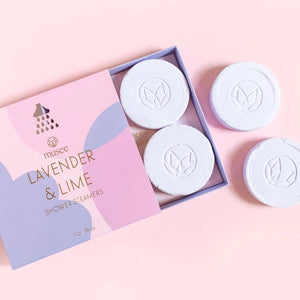 Musee Lavender & Lime shower steamers in a purple box on a pink background | Build A Luxury Custom Gift Box for Women with Luxe & Bloom