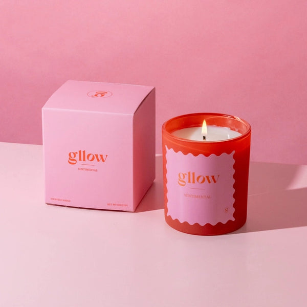 Glow Sentimental Scented Candle with pink packaging on a pink background | Build A Luxury Custom Gift Box for Women with Luxe & Bloom