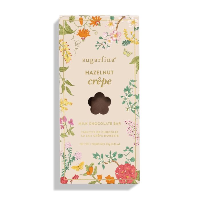 Sugarfina Hazelnut Crèpe Chocolate Bar packaging with floral design on a white background | Build A Luxury Custom Gift Box for Women with Luxe & Bloom
