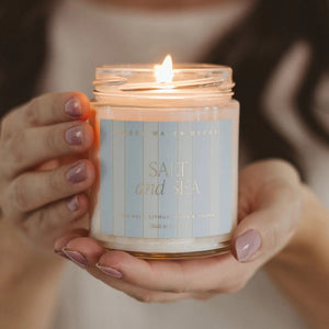 Woman Holding Sweet Water Decor Salt & Sea Candle | Build A Luxury Custom Gift Box for Women with Luxe & Bloom