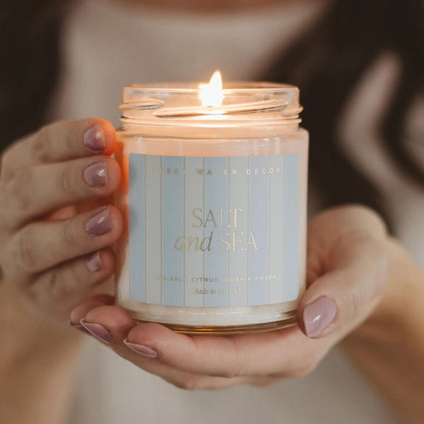 Woman Holding Sweet Water Decor Salt & Sea Candle | Build A Luxury Custom Gift Box for Women with Luxe & Bloom