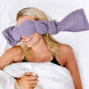Woman Wearing The Nodpod Wisteria Weighted Eye Mask | Build A Luxury Custom Gift Box for Women