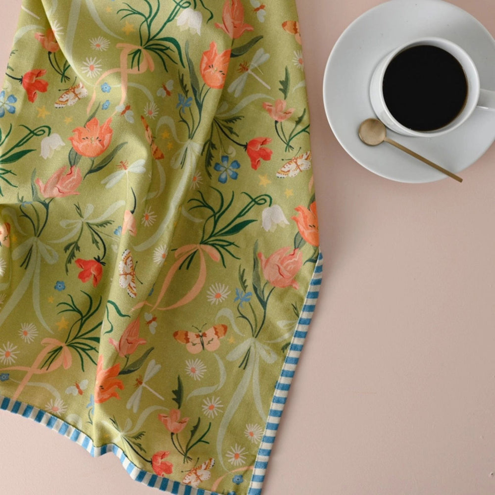 Amy Heitman Tulip Festival floral patterned tea towel with 'Tulip Festival' label on a white background  | Build A Luxury Custom Gift Box for Women with Luxe & Bloom
