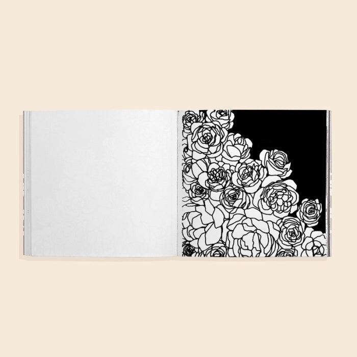 Coloring book titled 'Bloom' with floral illustrations on a beige background