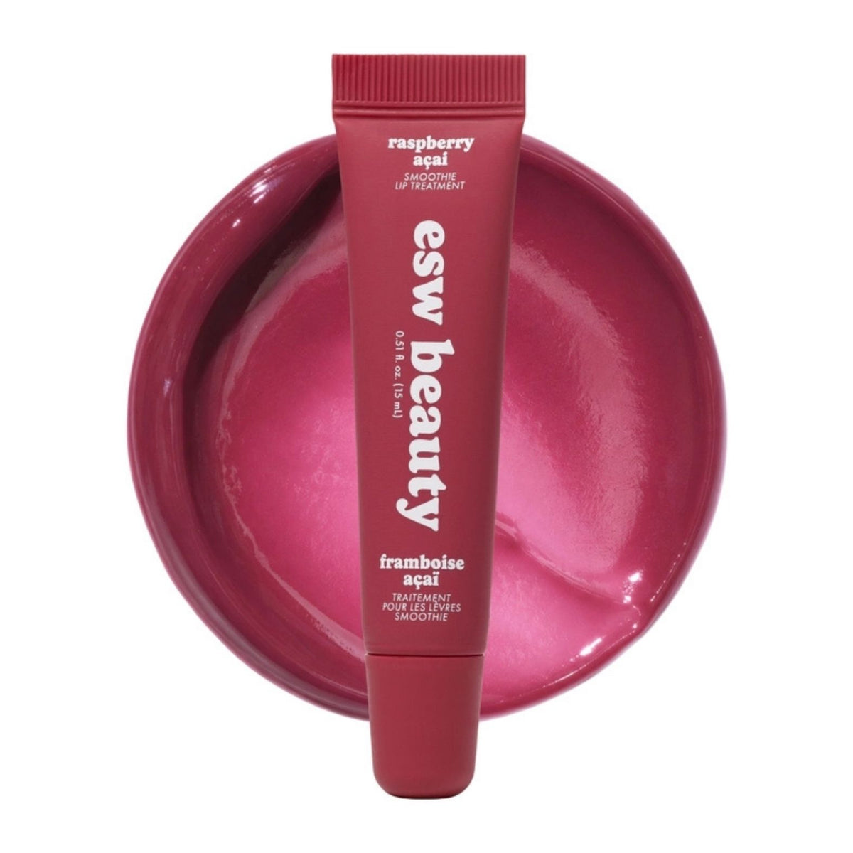 ESW Beauty Raspberry Acai Smoothie Lip Treatment on top a deep berry colored product swatch | Build A Luxury Custom Gift Box for Women with Luxe & Bloom