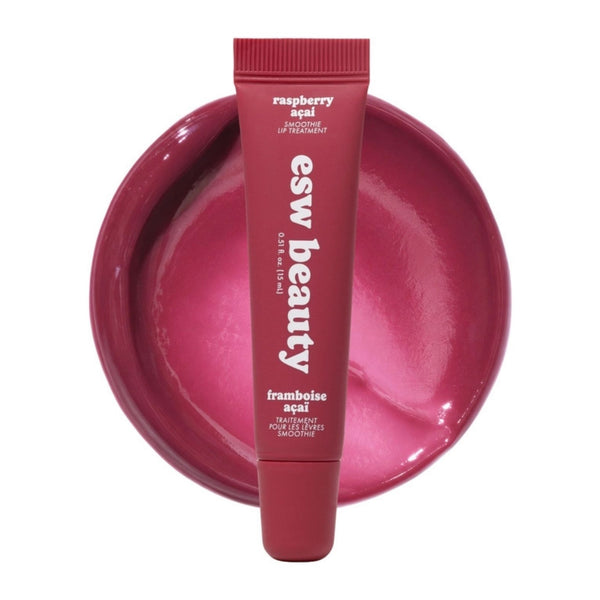 ESW Beauty Raspberry Acai Smoothie Lip Treatment on top a deep berry colored product swatch | Build A Luxury Custom Gift Box for Women with Luxe & Bloom