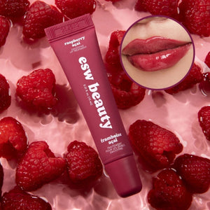 ESW Beauty Raspberry Acai Smoothie Lip Treatment with raspberries on a pink background | Build A Luxury Custom Gift Box for Women with Luxe & Bloom