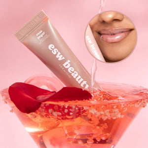 esw beauty rose sugar lip balm tube with rose petals in a red drink and a close-up of lips on a pink background