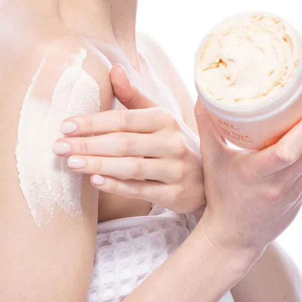 Woman applying Sunny Dippin’® Foaming Body Polish | Build A Luxury Custom Gift Box for Women with Luxe & Bloom
