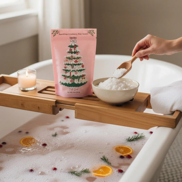 Latika Beauty Pink Christmas Tree Bath Soak on a bath caddy over a full bath tub | Build A Luxury Custom Gift Box for Women with Luxe & Bloom