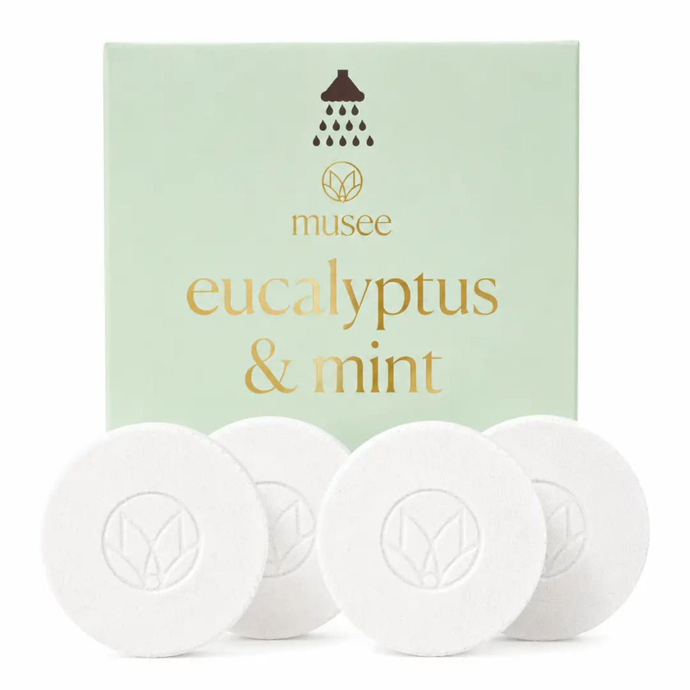 Musee Eucalyptus & Mint Shower Steamers with light green and gold packaging on a white background | Build A Luxury Custom Gift Box for Women with Luxe & Bloom