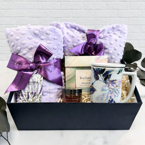 Comfort & Calm luxury comfort gift box with lavender spa wrap, spa mask, Tea Forté wellness tea, raw honey, and butterfly tea mug for surgery recovery, sympathy, cancer treatment, and encouragement.