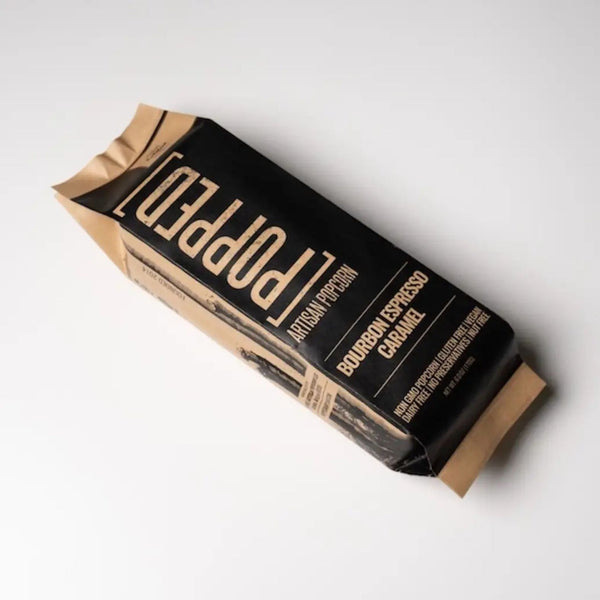 Popped Bourbon Espresso Caramel Artisan Popcorn craft & black package on a clean white background | Build A Luxury Custom Gift Box with Luxe & Bloom