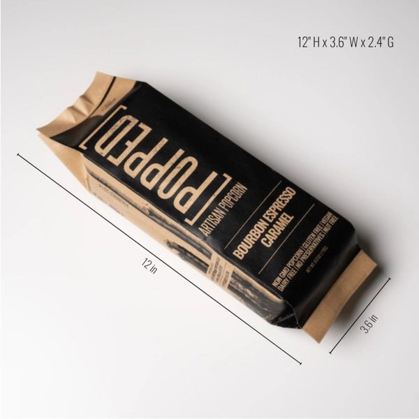Popped Bourbon Espresso Caramel Artisan Popcorn craft & black package on a clean white background with dimensions: 12" x 3.6"| Build A Luxury Custom Gift Box with Luxe & Bloom