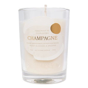 Rewined Champagne Candle 6 oz candle in a clear glass jar with gold writing and accents on a white background | Build A Luxury Custom Gift Box for Women with Luxe & Bloom