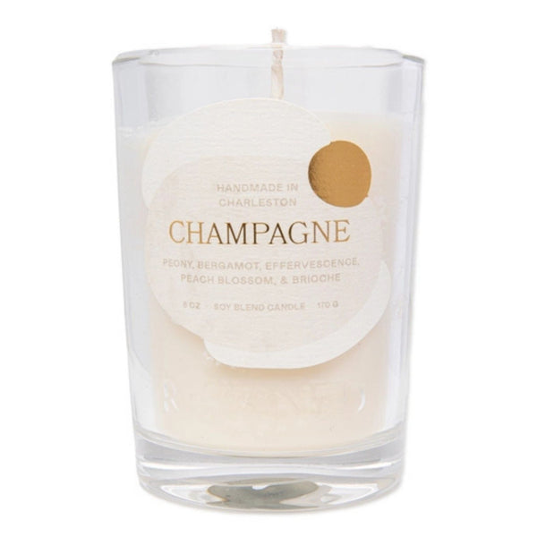 Rewined Champagne Candle 6 oz candle in a clear glass jar with gold writing and accents on a white background | Build A Luxury Custom Gift Box for Women with Luxe & Bloom
