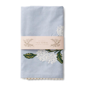 Folded Rifle Paper Co. Light Blue Hydrangea Embroidered Tea Towel on a white background | Build A Luxury Custom Gift Box for Women with Luxe & Bloom