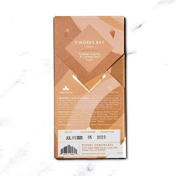 Back view of a Ritual Chocolate S'mores Bar packaging on a marble surface | Build A Luxury Custom Gift Box with Luxe & Bloom