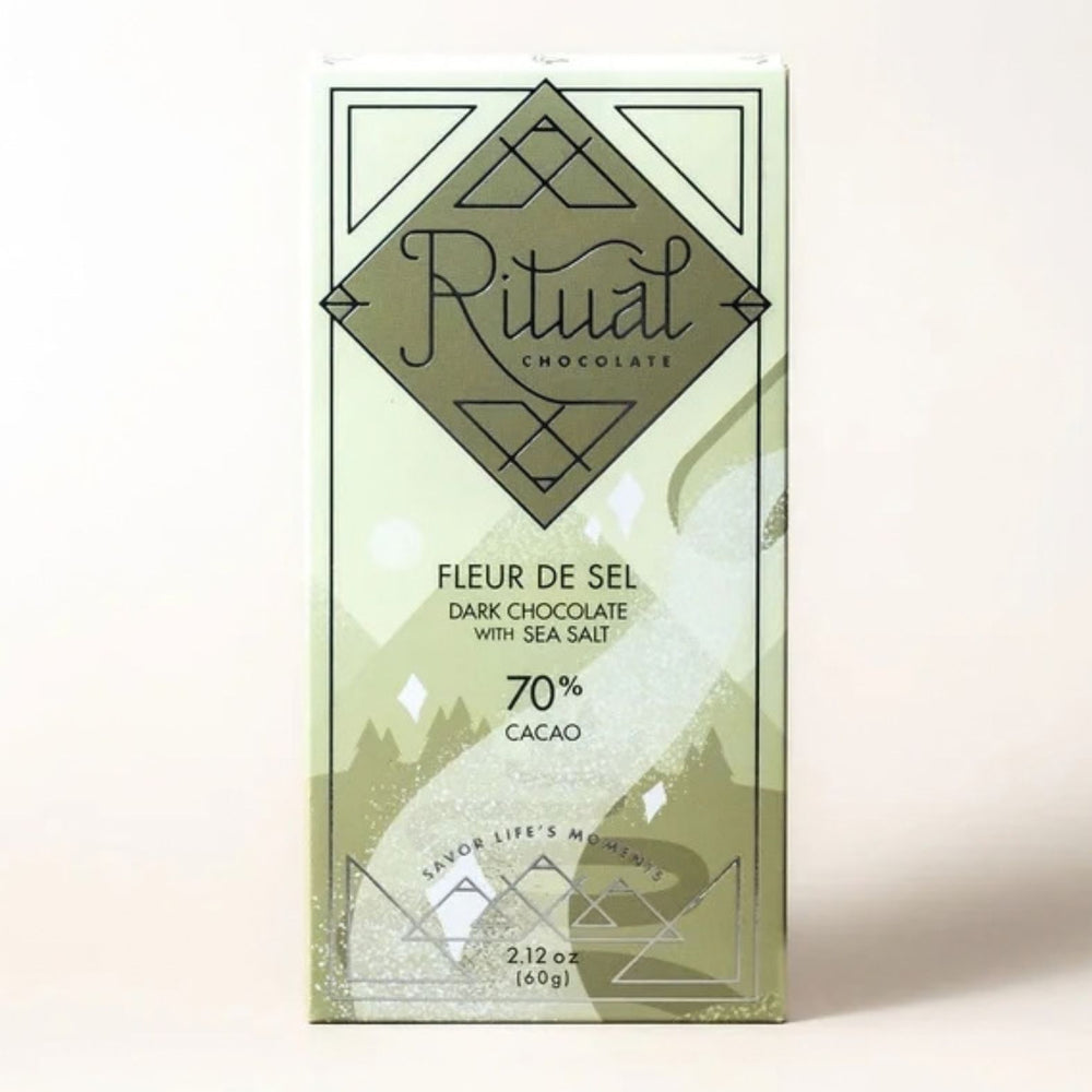 Ritual Chocolate Fleur De Sel Chocolate Bar in green packaging with a mountain and tree design on a white background | Build A Luxury Custom Gift Box with Luxe & Bloom