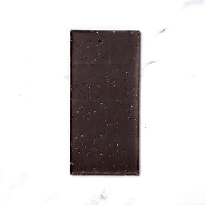 Ritual Chocolate Fleur De Sel Chocolate Bar close-up with sea salt one chocolate on a white background | Build A Luxury Custom Gift Box with Luxe & Bloom