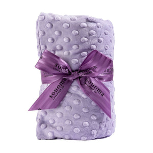 Sonoma Lavender Heated Spa Wrap in Lilac Dot fabric with a purple ribbon on a white background