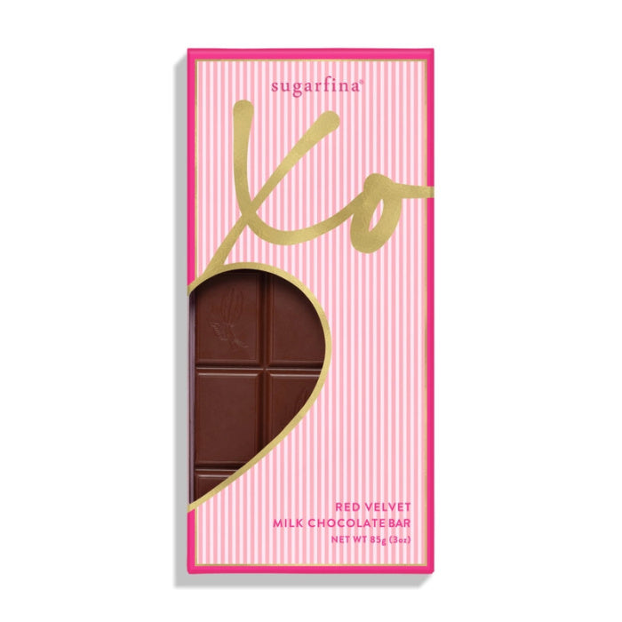 Red velvet milk chocolate bar in a pink and gold 'sugarfina' box on a white background | Build A Luxury Custom Gift Box for Women with Luxe & Bloom