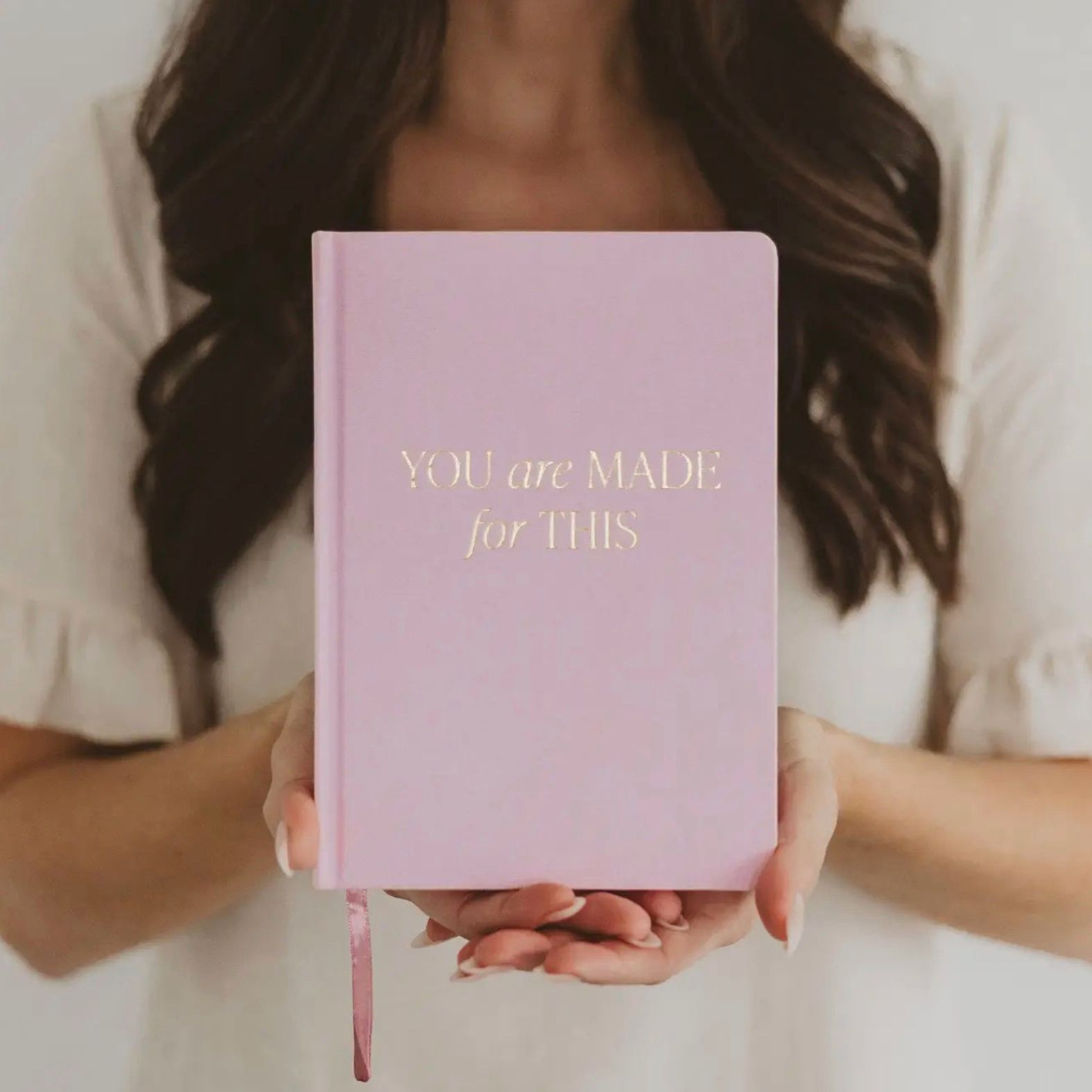 Woman holding the Sweet Water Decor You Are Made For This Journal | Build A Luxury Custom Gift Box for Women with Luxe & Bloom