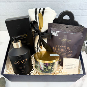 Welcome Home Luxury Curated Gift Box with L'avant fresh linen hand soap, Turkish kitchen towel, mini charcuterie board set, Champagne popcorn, Volcano candle, and home matchbox | Housewarming Gift or Realtor Gift from Luxe & Bloom