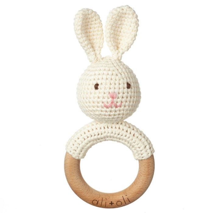 Ali + Oli Crocheted bunny rattle with wooden ring on a white background | build a custom baby gift box with Luxe & Bloom