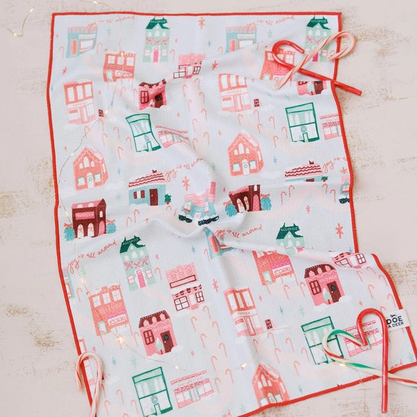 Doe A Deer Christmas in the Village Waffle Kitchen Towel on a wooden surface | Build A Luxury Custom Christmas Gift Box for Women with Luxe & Bloom