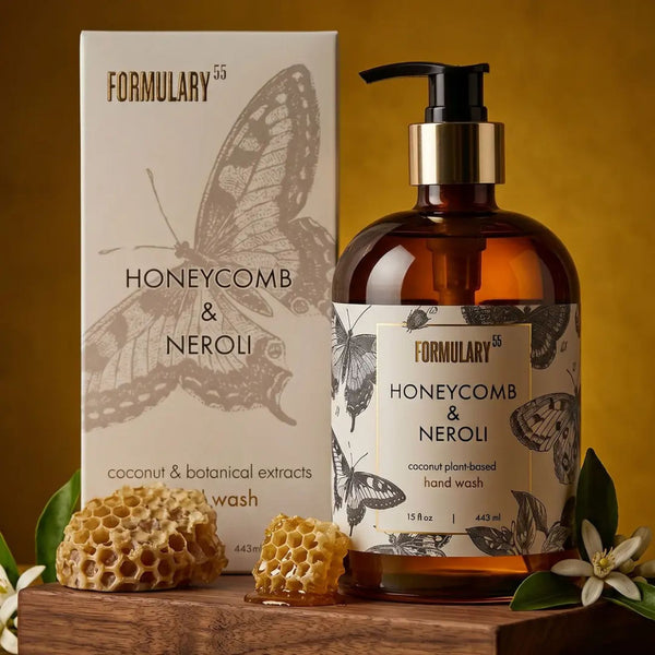 Formulary 55 Honeycomb & Neroli hand wash bottle and packaging on a wooden surface with honeycomb and flowers  | Build A Luxury Custom Gift Box for Women with Luxe & Bloom