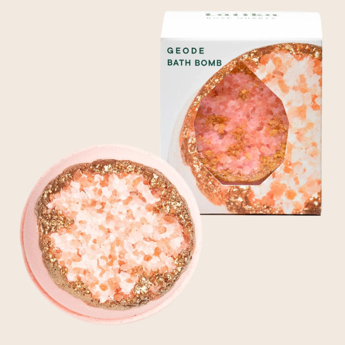 Latika Beauty Rose Quartz Geode bath bomb with packaging on a beige background | Build A Luxury Custom Gift Box for Women with Luxe & Bloom