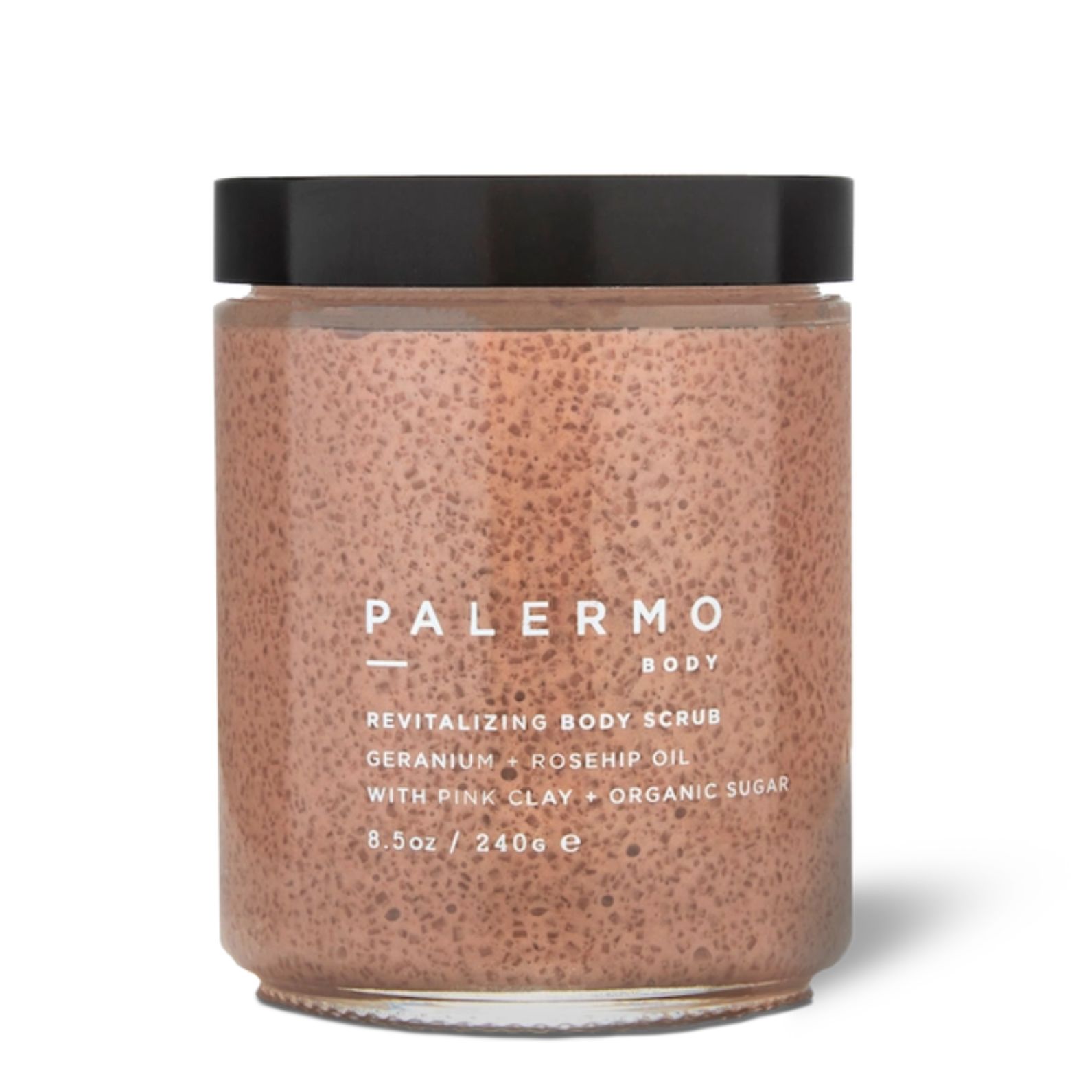 A jar of Palermo Body Revitalizing Body Scrub with pink clay and organic sugar, featuring a speckled pink scrub inside a clear glass jar with a black lid, on a white background | Build A Luxury Custom Gift Box for Women with Luxe & Bloom