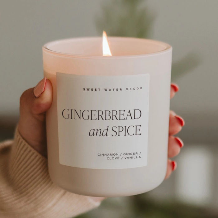 Woman Holding Sweet Water Decor Gingerbread & Spice Candle | Build A Luxury Custom Gift Box for Women with Luxe & Bloom