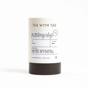 Cylindrical tube of Tea with Tae Fruit & Berry Oolong Tea on a white background | Build A Luxury Custom Gift Box with Luxe & Bloom