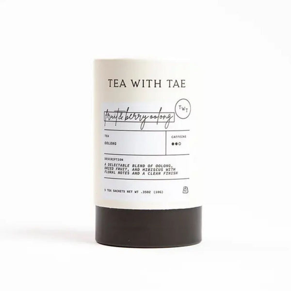 Cylindrical tube of Tea with Tae Fruit & Berry Oolong Tea on a white background | Build A Luxury Custom Gift Box with Luxe & Bloom