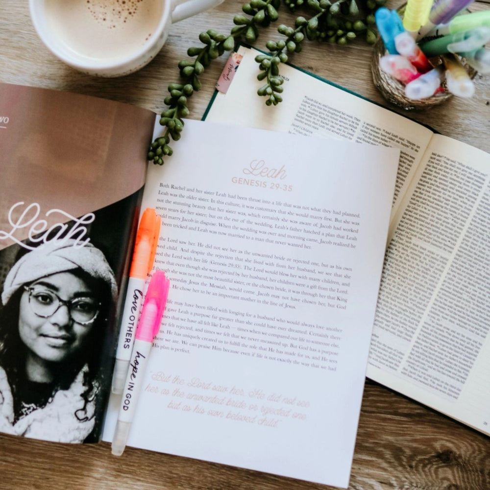 The Daily Grace Co. Daughters of Grace Bible Study sitting on a table with coffee and a throw blanket | Build A Luxury Christian Custom Gift Box for Women with Luxe & Bloom