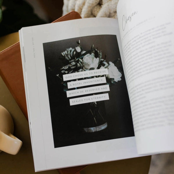 Open The Daily Grace Co. Devotional called 'Worthy: embracing your identity in Christ' with a floral picture and text