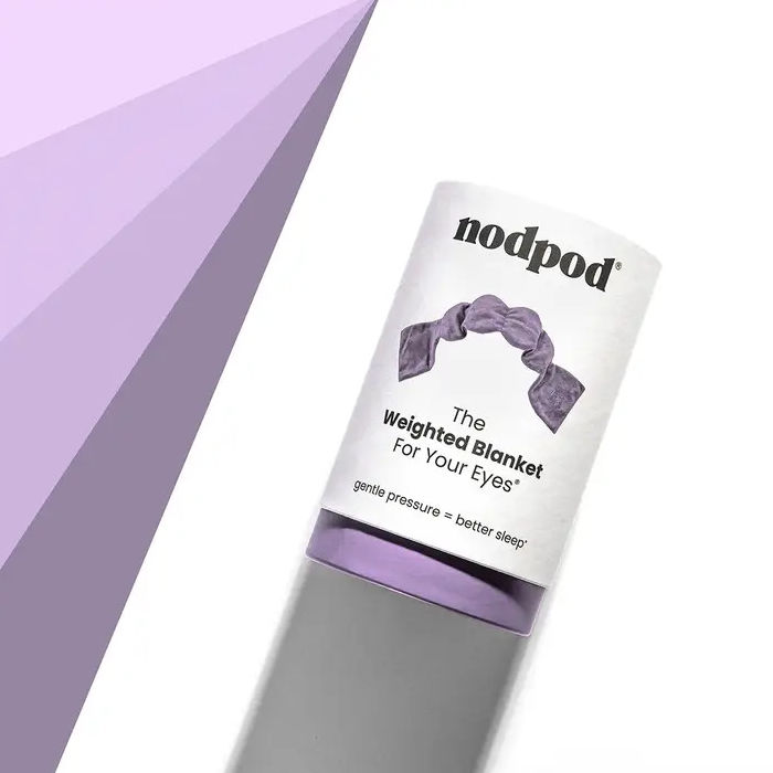 Woman Wearing The Nodpod Wisteria Weighted Eye Mask | Build A Luxury Custom Gift Box for Women